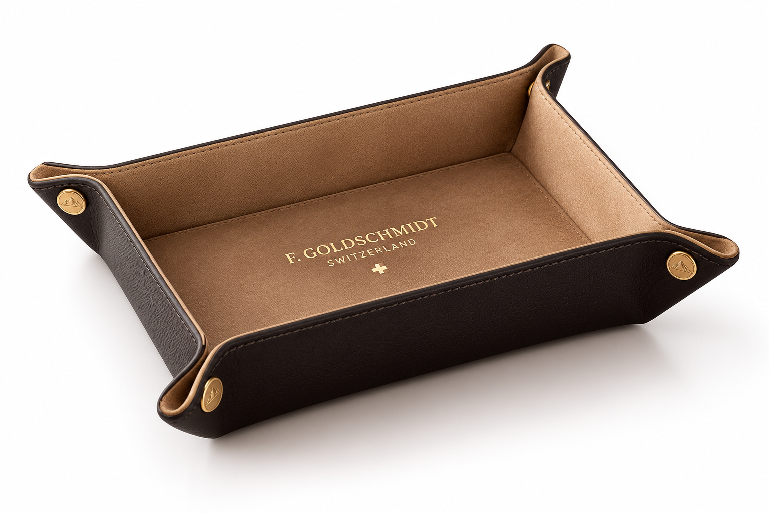 Brushed brass valet tray with minimalist geometric contours